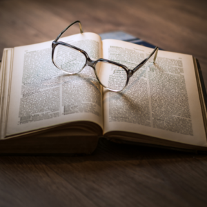 glasses on top of a book